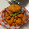 Breaded chicken tender, bacon, provolone cheese, tomato, lettuce and mayo on a toasted potato bun.
