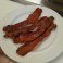 Four crispy strips of bacon.