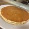 Single fluffy pancake cooked golden brown.