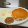 Single fluffy pancake cooked golden brown.