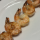Grilled shrimp skewer side portion.